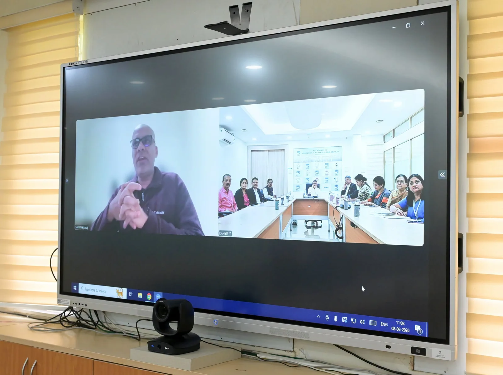 Remote participation displayed on the meeting room screen